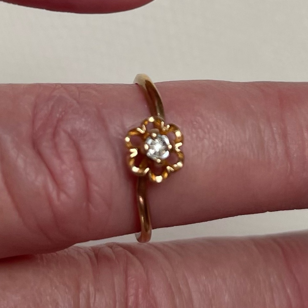 14K yellow gold ring with small genuine diamond